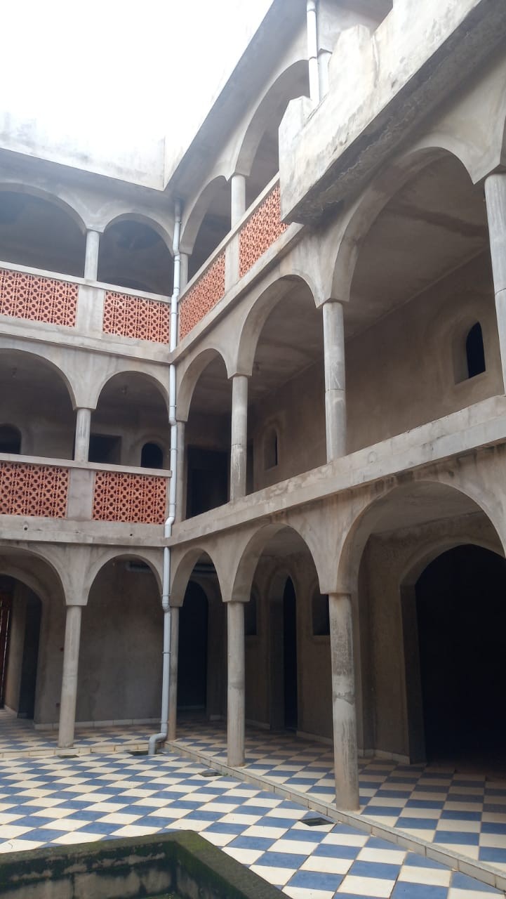 Relais Castle Moroccan β Multi-story building with castle-like crenellated walls and arched openings