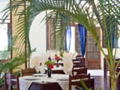 Saint Mary Club β Restaurant interior with tropical decor